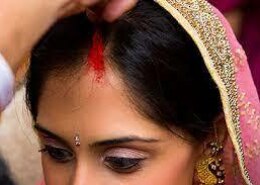 Why do some Sikh females wear sindoor while others don’t, considering that sindoor isn’t part of Sikhism? Can someone provide Sikh examples from Gurbani or Sikh history to support the answer?